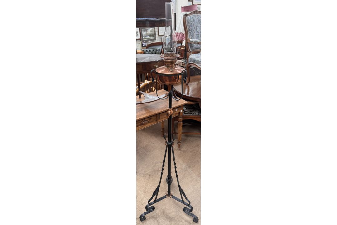 A Victorian copper and cast iron standard oil lamp