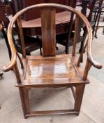 A Chinese horseshoe-back armchair of classical form,