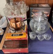 A Brockway glass Punch bowls and glasses together with an Aspen set and a Fondue set