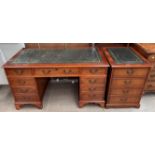 A reproduction yew pedestal desk together with a matching filling cabinet