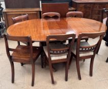 A Regency mahogany extending dining table, with an additional leaf,
