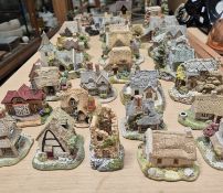 A collection of Lilliput Lane and other cottages including Tranquil Treasure, St Joseph's Church,