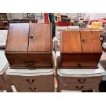 An Edwardian oak table top stationery cabinet with a sloping front enclosing compartments,