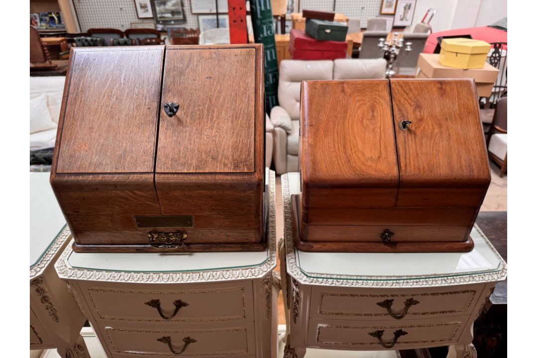 An Edwardian oak table top stationery cabinet with a sloping front enclosing compartments, - Image 1 of 2