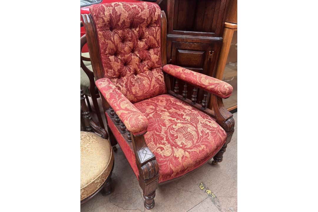 A Victorian mahogany framed library chair with deep buttoned upholstery, - Image 1 of 3