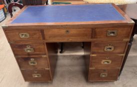A mahogany Campaign desk, with a rectangular top and brass corner,