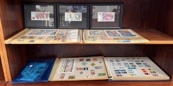 A Stamp album together with loose stamps,