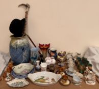 A Royal Doulton floral decorated jug together with a camel china part tea service,