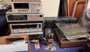 A Pioneer stereo cassette tape deck Model CT-F2121 together with a Sanyo VCR VTC 6500,