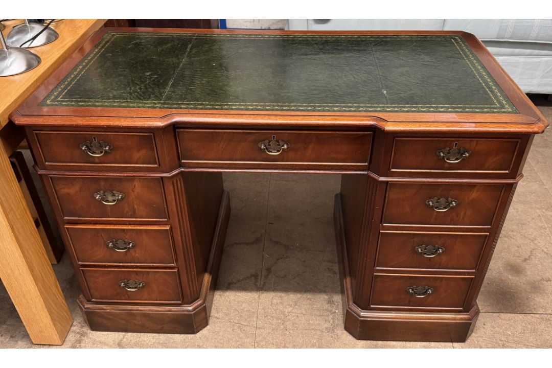 A Charles Barr reproduction pedestal desk with a leather inset inverted breakfront top above a - Image 1 of 8