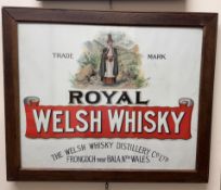 An advertising poster depicting a lady in Welsh dress amongst hills for 