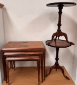 A rosewood nest of three tables together with a pair of mahogany wine tables