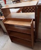 A 20th century oak bookcase together with a teak example