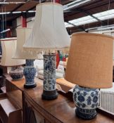A Japanese Imari pattern vase converted to a table lamp together with three Chinese blue and white