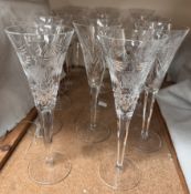 A matched set of fourteen Waterford crystal Champagne flutes