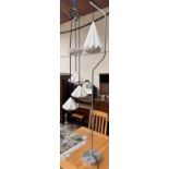 A Hatton 1 grouping of three pendant light manufactured by Original BTC,