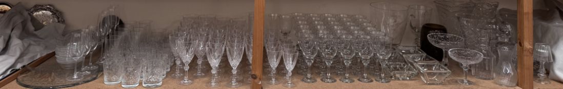 Glass decanters together with glass vases and a large quantity of drinking glasses