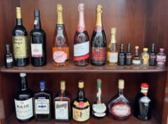 A bottle of Haig blended Scotch Whisky together with Cointreau,