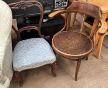 A bentwood elbow chair together with a Victorian mahogany balloon back chair
