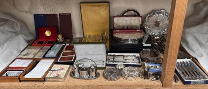Continental white metal forks and spoons together with electroplated flatwares, bottle coaster,