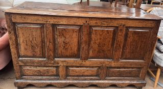 An 18th century oak mule chest,