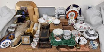 A lacquered glove box together with playing card boxes, tins, trays, candles, desk clocks,