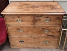 A Victorian pine chest with a rectangular top above two short and two long drawers