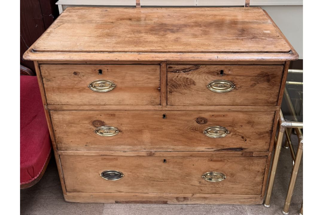 A Victorian pine chest with a rectangular top above two short and two long drawers