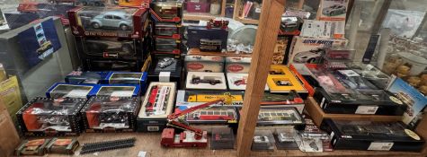 A large collection of model vehicles including Burago, Maisto,