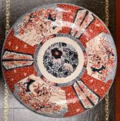 A Japanese Imari charger decorated with horses amongst foliage, 46.