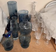 Assorted blue glasswares including vases, candlesticks,