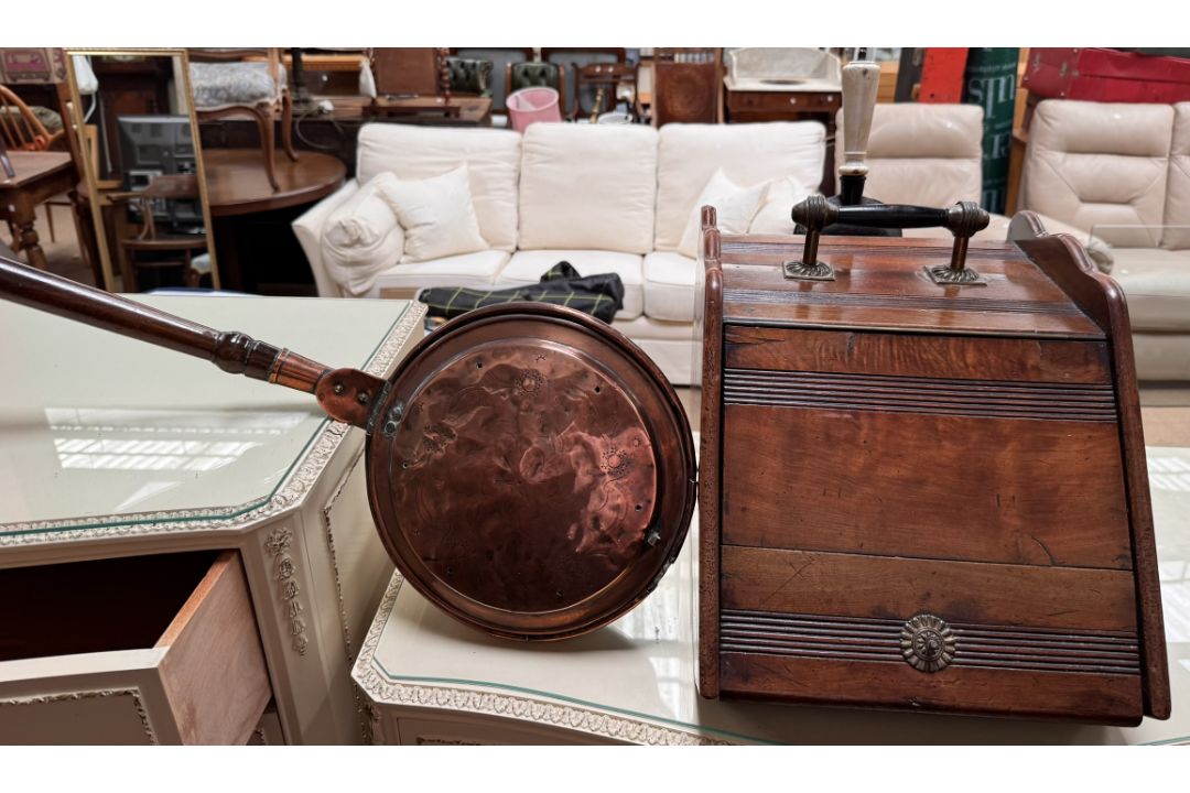 A copper bed warming pan together with a coal purdonium etc