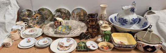 A blue and white jug and basin set together with copper lustre jugs, a large pottery meat plate,