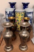 A Chinese prunus blossom pattern baluster vase together with a pair of cylindrical vases decorated