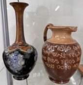 A Royal Doulton stoneware jug slip decorated 