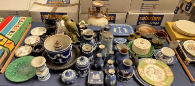 A collection of Wedgwood jasperwares including vases, clock etc together with decorative plates,