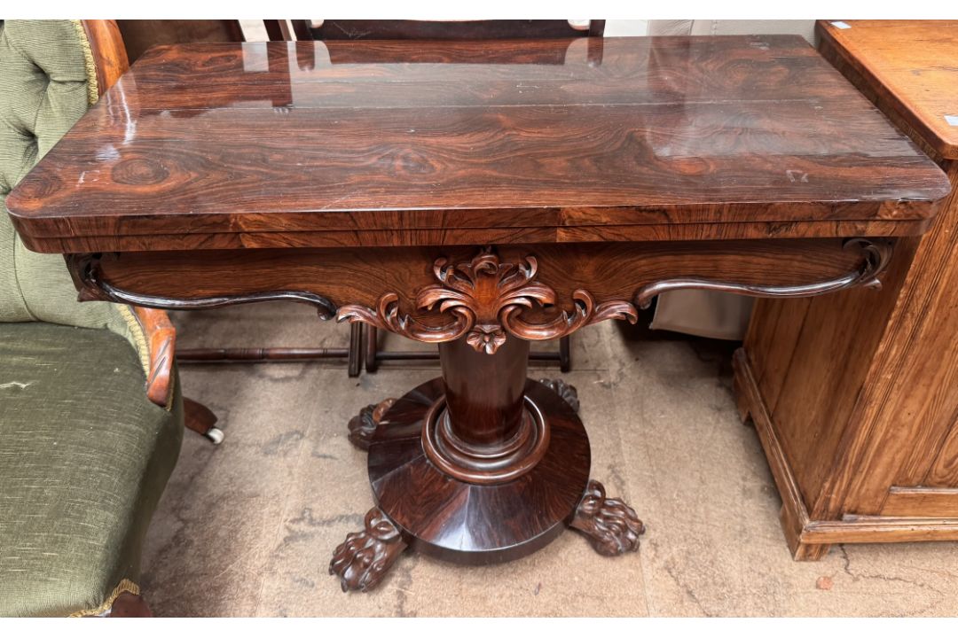 A Victorian rosewood card table with a foldover top lacking baize on a pedestal column, - Image 1 of 2