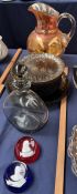 A carnival glass jug together with glass plates,