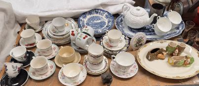 Assorted decorative cups and saucers together with decorative plates,