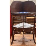A George III mahogany corner washstand,
