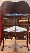 A George III mahogany corner washstand,