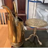 A brass coal scuttle together with a brass trivet