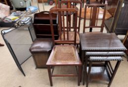 Three bedroom chairs together with a nest of three tables, a magazine rack,