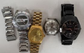 A Tissot Sea star electronic wristwatch and three other wristwatches