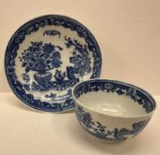 An 18th century Worcester bat pattern blue and white tea bowl and saucer