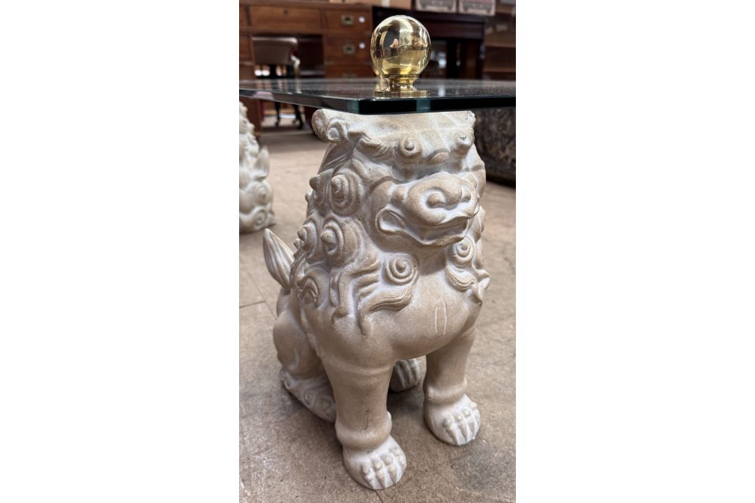 A glass topped coffee table with a rectangular top on four seated dog of foo legs, 122cm x 68. - Image 2 of 2