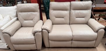 A leather two seater recliner settee together with a matching reclining armchair