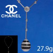 CHANEL, ONYX AND DIAMOND PENDANT NECKLACE