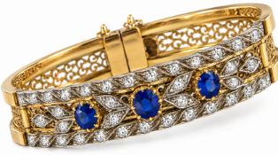 ANTIQUE SAPPHIRE AND DIAMOND HINGED BANGLE
