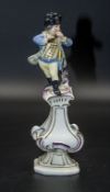 Musikant mit Querflöte auf Postament / A musician with a transverse flute on a pedestral, ...